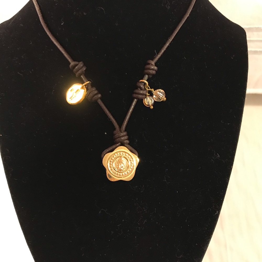 Gold filled Guadalupe Virgin pendant.